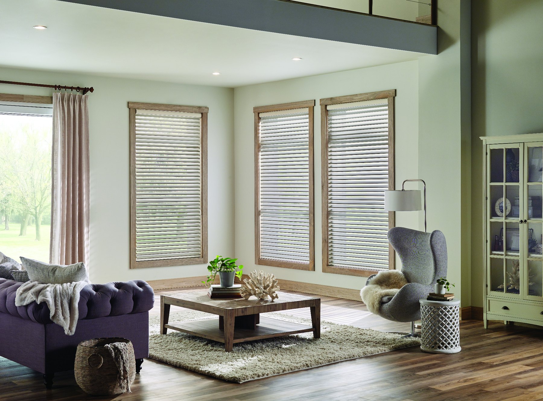 Layered sheer blinds with lounge seating