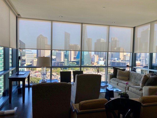 High-rise roller shades in living room