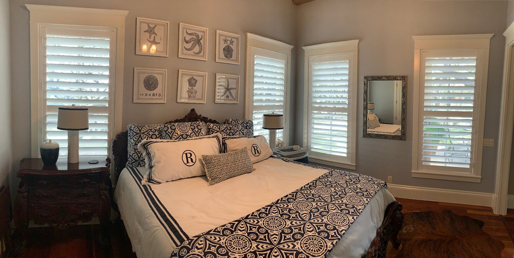 Bedroom with custom plantation shutters